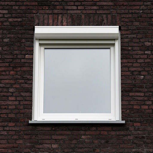 Detail antraciet grijze kunststof kozijnen op lichte baksteen gevel Oosterhout