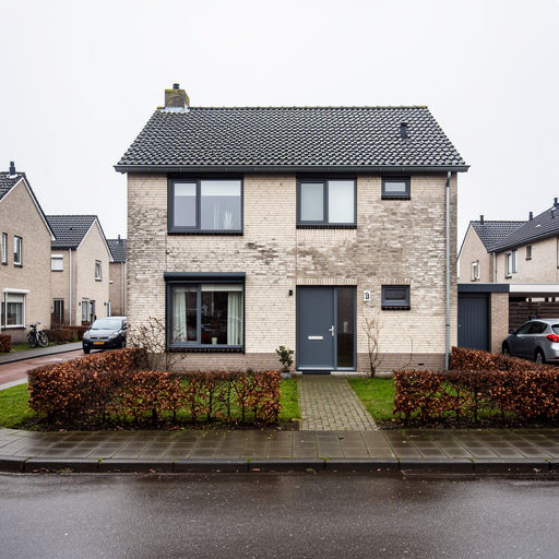 Jaren dertig hoekwoning Oosterhout met houtlook kunststof kozijnen en wit pleisterwerk